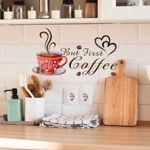 Kitchen wall decal featuring red coffee cup and But First Coffee text on white tiles