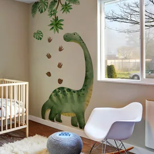 Macro detail of watercolor dinosaur wall stickers with green brontosaurus and tropical leaves