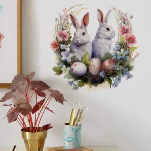 Détail du sticker mural de Pâques avec des lapins blancs et des œufs fleuris