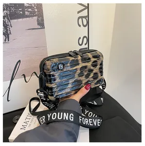 Mini leopard print suitcase bag with black Forever Young wide strap and FY logo detail