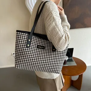 Classic black and white houndstooth large capacity tote bag with black leather straps