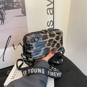 Mini leopard print suitcase cross-body bag with stylish Forever Young wide strap