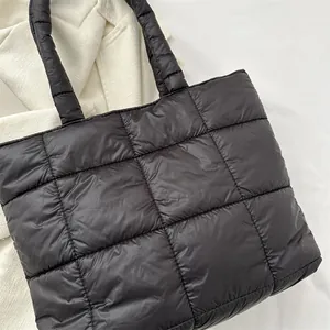 Quilted black puffer tote bag with large capacity and soft checkered padded nylon finish