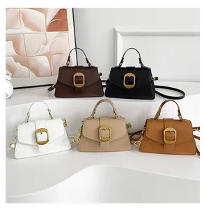 Detailed collection of vintage square handbags featuring large gold woven texture buckles