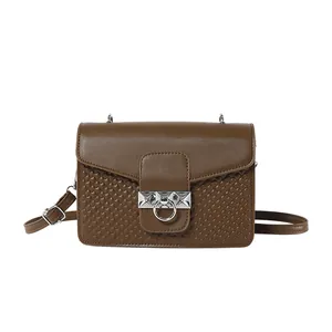 Deep brown crossbody bag for women with woven texture and silver ring detail