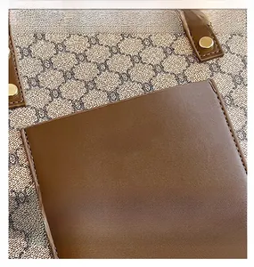 Detailed macro view of vintage canvas texture with leather pocket and golden rivets