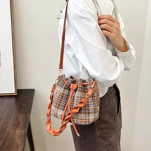 Retro plaid wool bucket bag with woven handle and drawstring closure for women