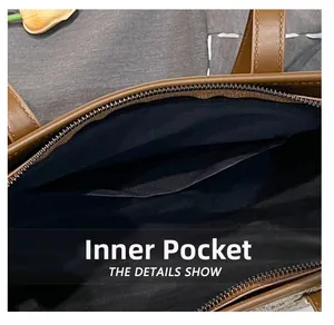 Detail view of the brown tote bag featuring an inner pocket and smooth zipper closure