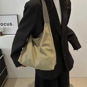 Minimalist large khaki suede hobo bag for women with wide integrated shoulder strap