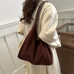 Retro large brown hobo tote bag in frosted suede leather for daily commute and autumn wear