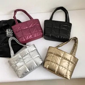 Quilted tote bags in metallic burgundy, black, silver and gold with large check pattern
