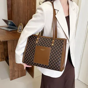 Large capacity tote bag with geometric pattern and front leather pocket for commuting