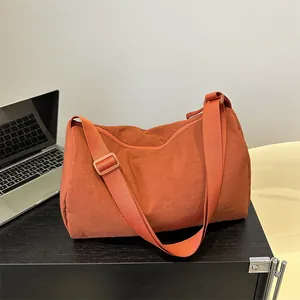 Japanese style brick red crossbody bag with wide adjustable strap for daily commute