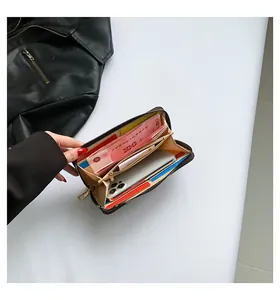 Macro view of interior storage showing card slots and compartments in the leather wallet