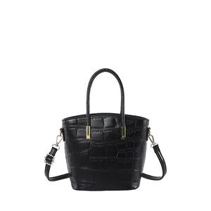 French style black crocodile pattern bucket bag with golden hardware and top handle