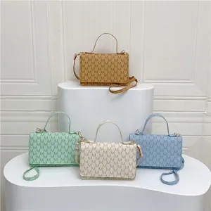 Minimalist small square tote bags with M-letter monogram in four assorted colors