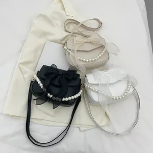 Chic French lace pearl shoulder bags with elegant organza bow in beige black and white