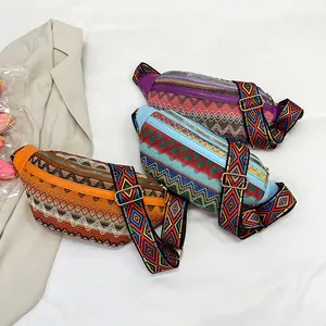 Close-up of woven ethnic chest bags with jacquard straps in various boho patterns