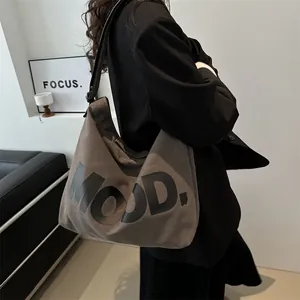 Minimalist canvas tote bag for women with MOOD lettering and wide black strap