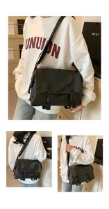 Vue détaillée d'un grand sac bandoulière noir en nylon avec sangle ajustable et deux boucles