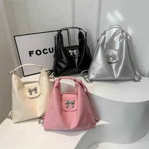 Sac hobo à la mode avec nœud en métal argenté et bandoulière chaîne en quatre couleurs
