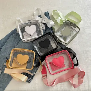 Borsa a tracolla trasparente in PVC con cuore e tracolla regolabile in cinque colori vivaci