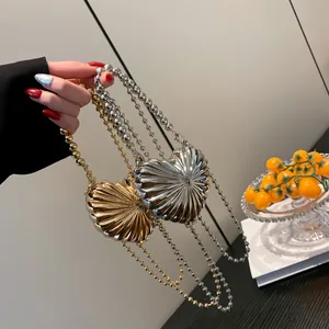 Mini heart shell evening bag in gold and silver finish with metallic bead chain strap