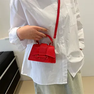 Elegant red crocodile pattern mini handbag for women with adjustable shoulder strap