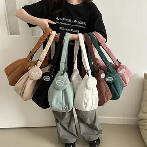 Corduroy dumpling crossbody bag with round coin purse in eight colors display
