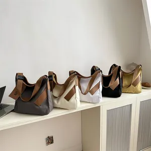 Borse tote minimaliste in tela in cinque colori con finiture in pelle e tracolla marrone