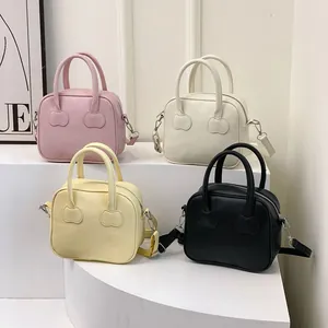 Minimalist square tote bags in four colors with cherry charms and detachable straps