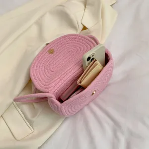 Pink woven cotton floral shoulder bag with golden magnetic clasp for beach vacation