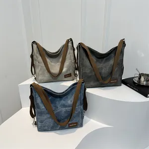 Denim canvas tote bag set in grey, charcoal and blue colors with adjustable straps