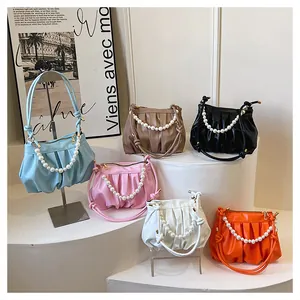 Detailed display of six color options for the ruched pearl strap cloud underarm bag