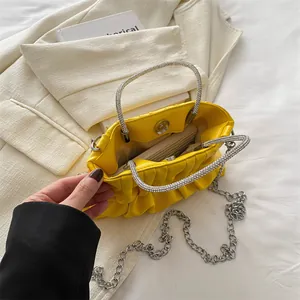 Chic pleated yellow crossbody bag with sparkling rhinestone metal handles and silver chain