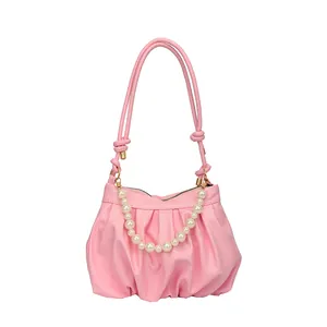 Chic pink ruched cloud shoulder bag with pearl chain handle and minimalist design