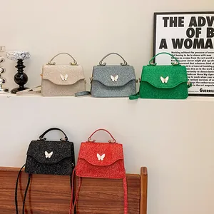 Mini sacs à bandoulière pailletés avec papillon en cinq couleurs à la mode