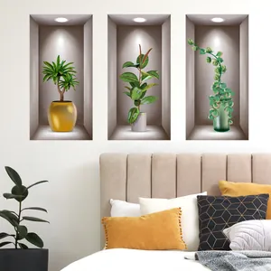 Three-piece set of 3D wall stickers featuring green plants on a bedroom headboard wall