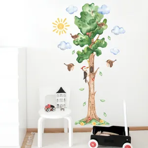 Detail of hand-painted tree wall decal with height chart measuring 40cm to 140cm for kids