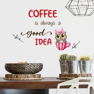 Detail of coffee theme wall decal featuring a cute owl in a cup for home cafe decor