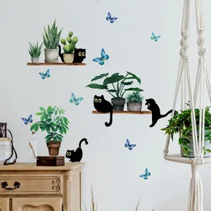 Selbstklebende Wandtattoos mit schwarzen Katzen, Topfpflanzen und blauen Schmetterlingen