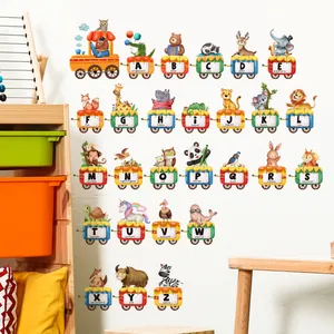 Close-up of animal alphabet train wall stickers in a cozy children playroom setting
