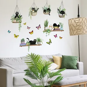 Creative wall decals featuring cartoon cats, green potted plants and colorful butterflies