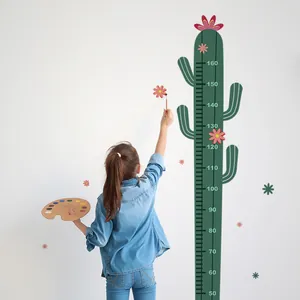 Detail view of cactus height chart wall decal showing measuring scale from 50 to 160 cm