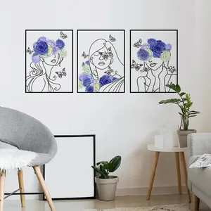Three-piece modern wall art set featuring minimalist line art women, flowers, and butterflies