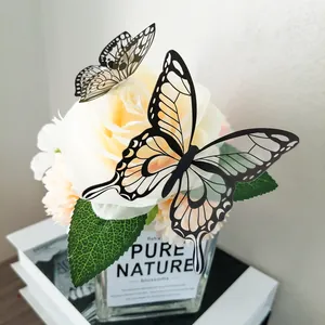 Detailed view of 3D black hollow butterfly wall stickers used for home decor
