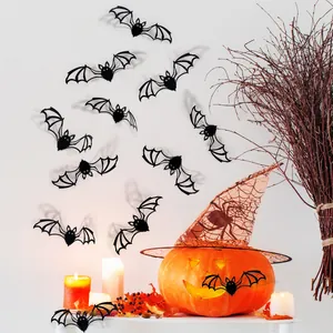 Detailed 3D black bat wall stickers for Halloween decor on a clean white interior wall