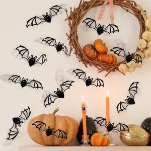 3D black bat wall decals arranged on a wall with pumpkins for Halloween home decor