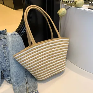Grand sac seau rayé en coton beige et blanc pour la plage et les sorties d'été