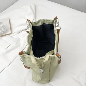 Light green pleated tote bag with large capacity and stylish silver chain strap details